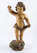 STEHENDER PUTTO ALS ERLÖSER, Holz,