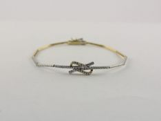 <de>ARMBAND, 585/ooo Weißgold und Gelbgold, besetzt mit Zirkonia, L 20, 6,3g</de>