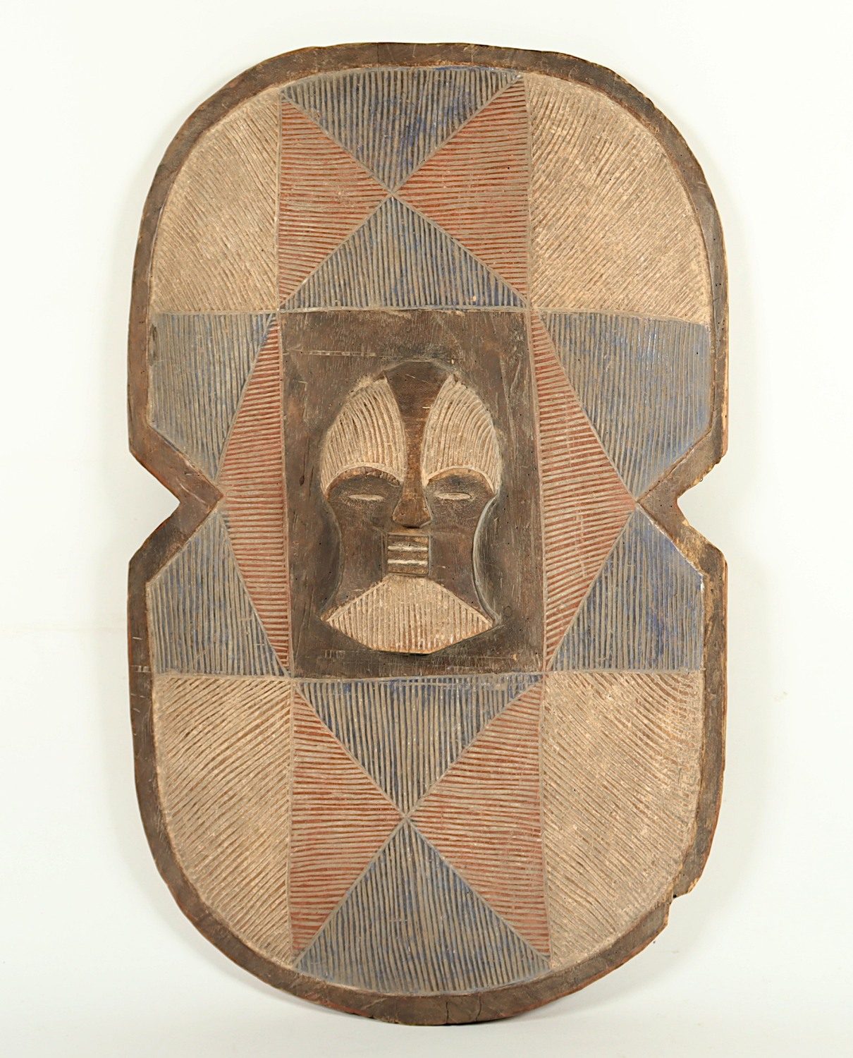 SCHILD, Holz, geschnitzt, polychrom bemalt, 87 x 52, AFRIKA, 20.Jh.