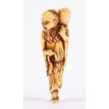 NETSUKE SENNIN TOBOSAKU, Elfenbein, der stehende Sennin hält in der einen Hand seinen Gürtel, mit