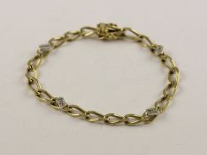 ARMBAND, 333/ooo Gelbgold, besetzt mit