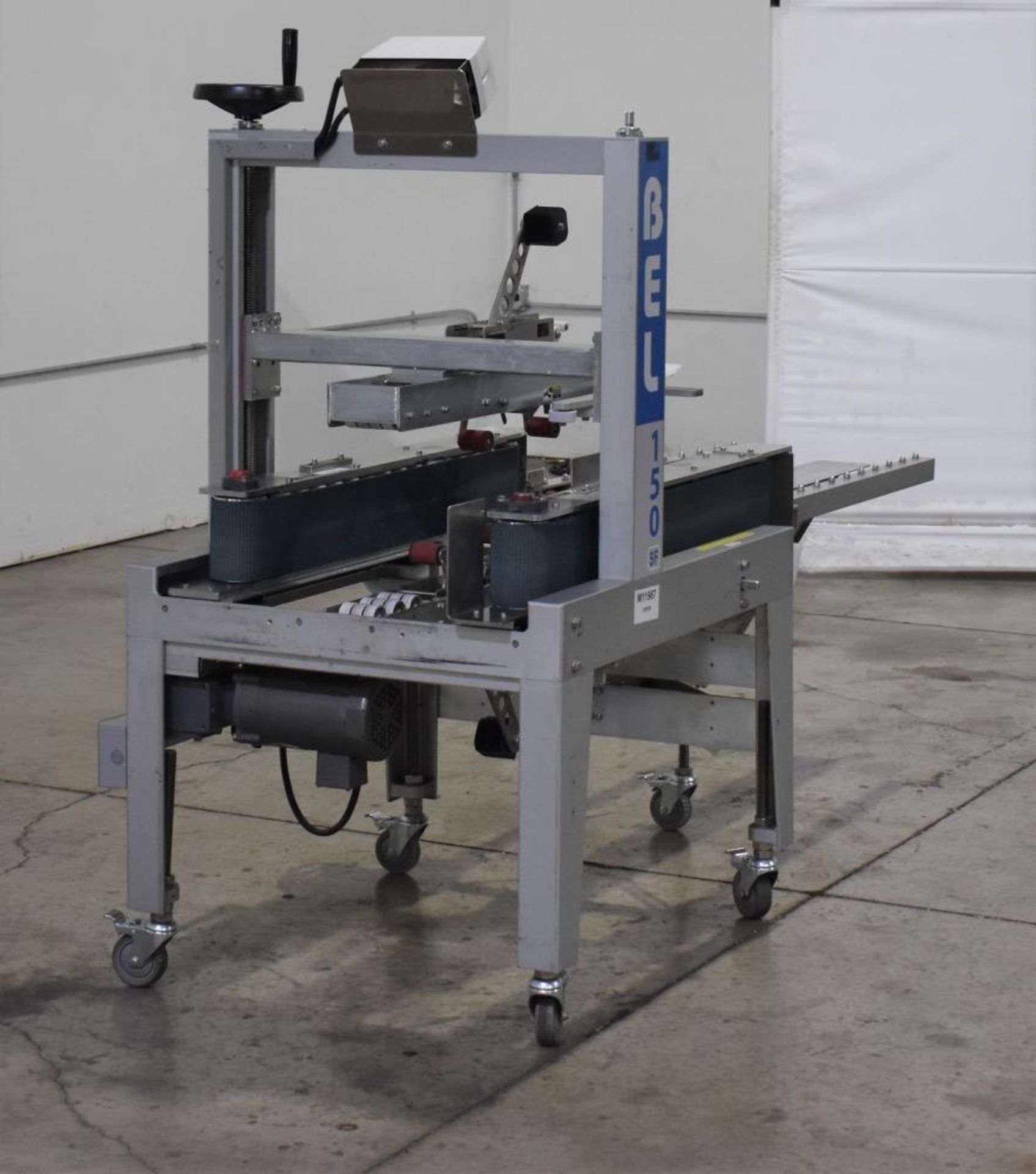 Used- Belcor 150 Top and Bottom Case Tape Sealer, Model BEL 150SF.