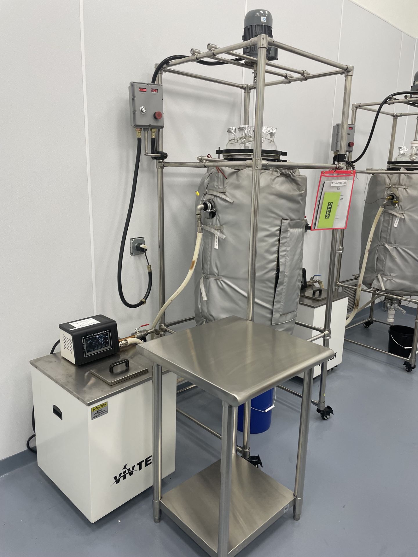 Used 200 L Agitated Jacketed Glass Reactor with Vivtek Chilling/ Heating Unit.