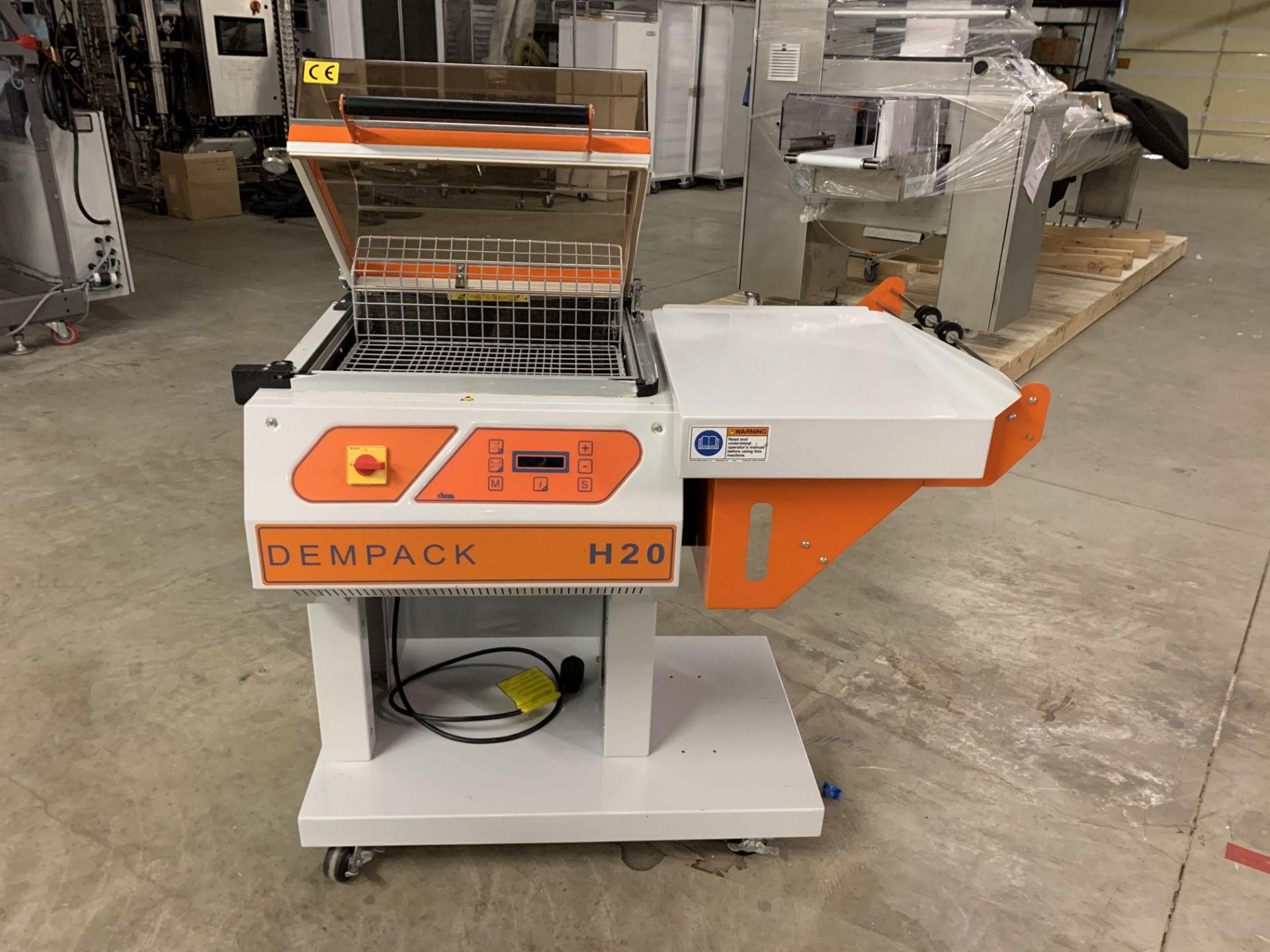 Used Dempack One Step Shrink Wrap Machine. Model H20.