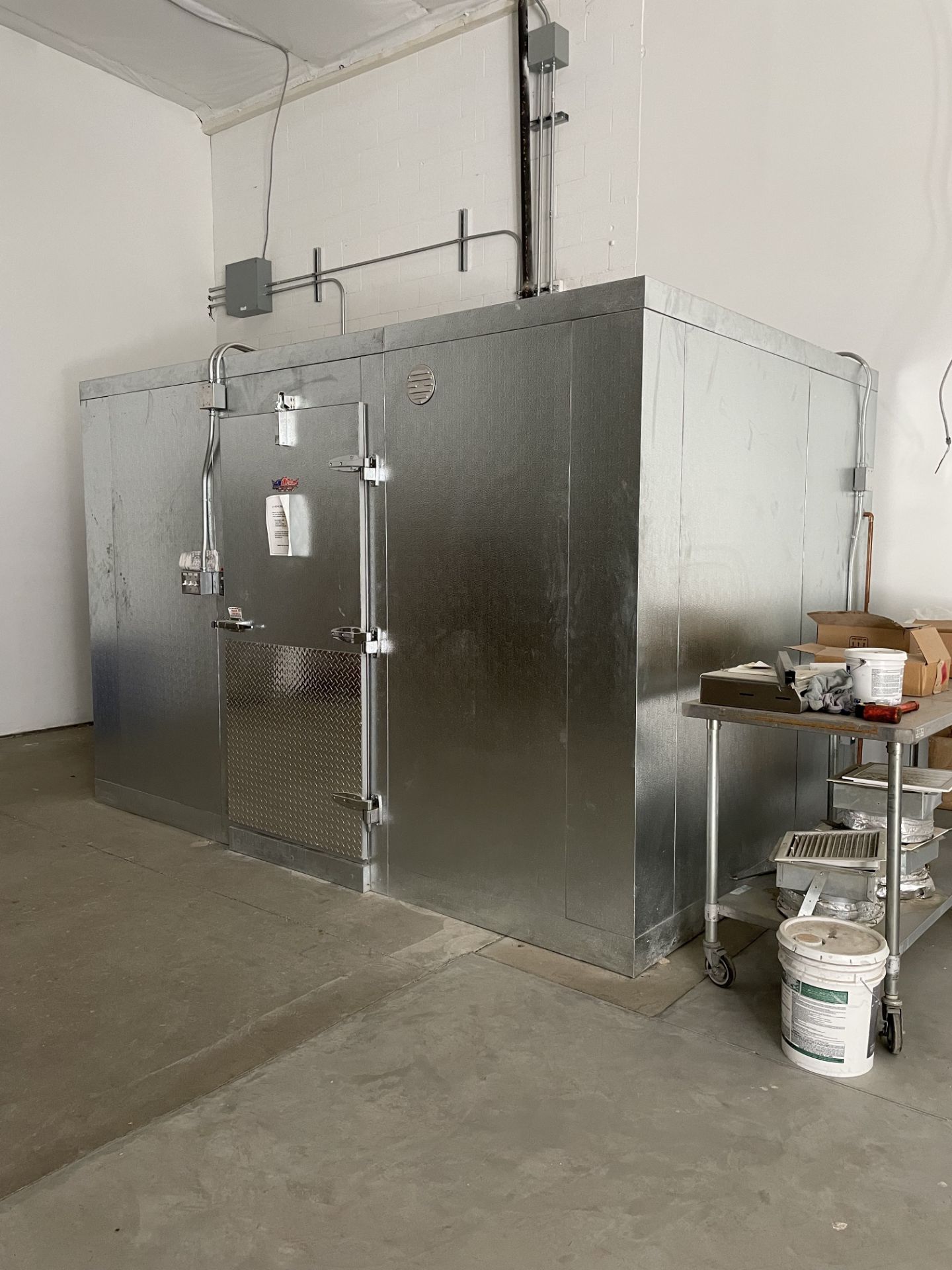 Unused AWIC Walk-in Freezer. Exterior Dimensions Approx. 12' Wide x 8' Deep x 8' Tall