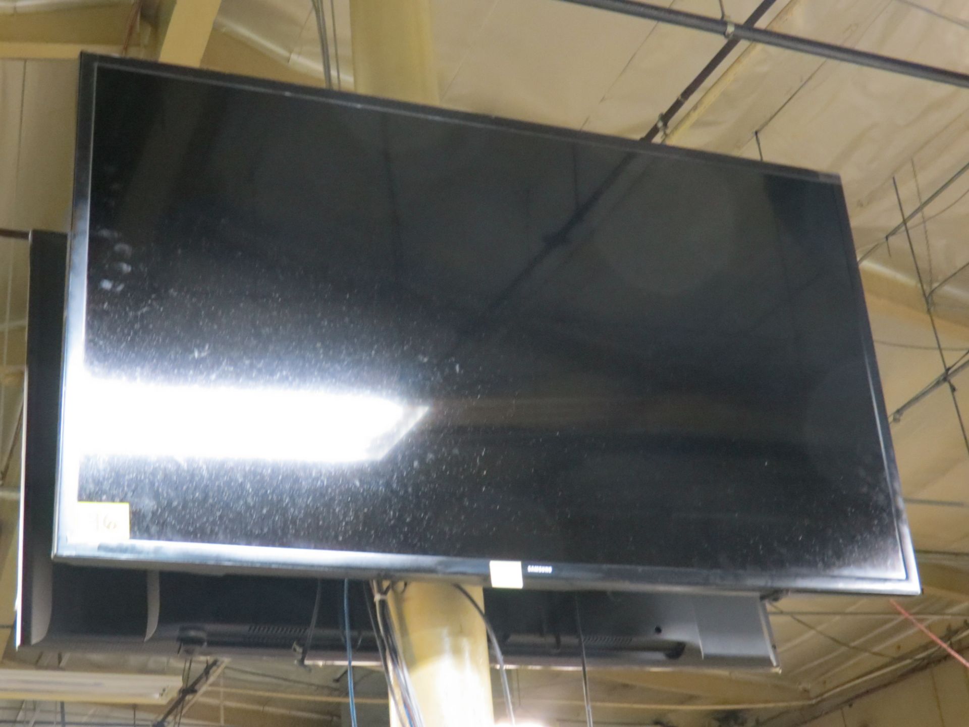 SAMSUNG 65" TV IN WAREHOUSE WITH MOUNT