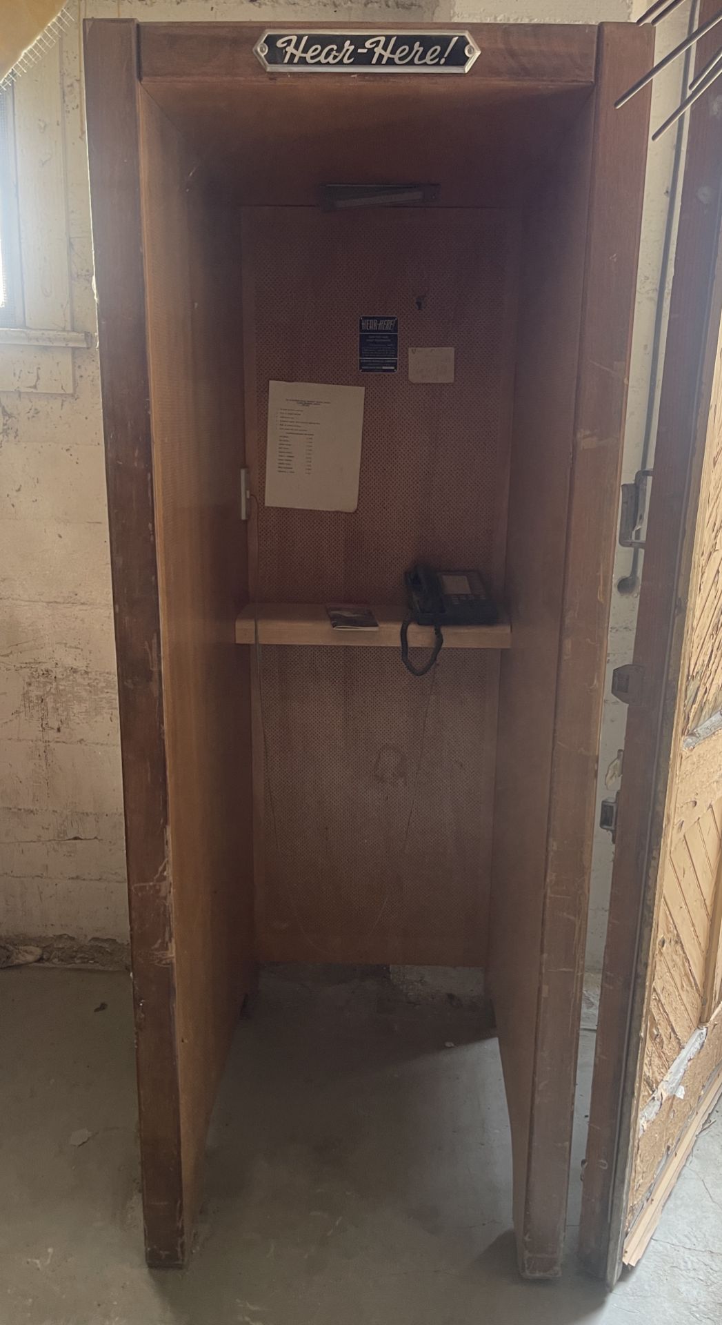 HEAR HERE PRIVATE QUIET TELEPHONE BOOTH BURGESS MANNING COMPANY ACOUSTIC BOOTH