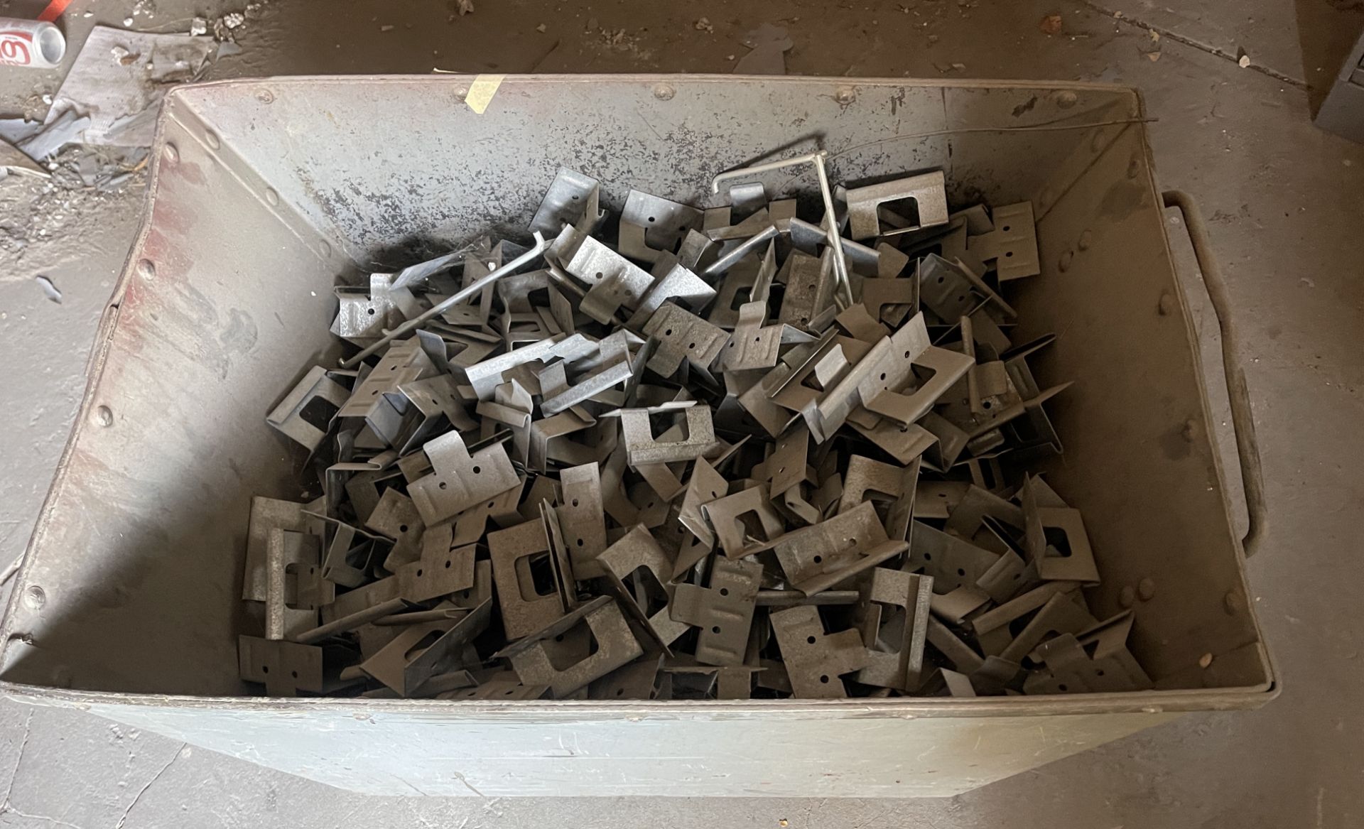 METAL SHOP BIN ON WHEELS FILLED WITH BRACKETS