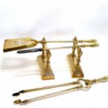 Antique brass set of fire dogs, irons, poker and shovel. All in good used condition.