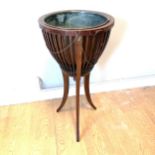 Antique mahogany jardinière stand with original liner, split to the top, one part of the chain
