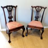2 x reproduction Chippendale style mahogany chairs with drop in pink brocade seats & ball and claw