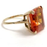 9ct marked gold ring set with a large orange stone - size S & 7.5g total weight ~ stone slightly