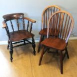 Antique Elm captains chair with small split to the back of the seat otherwise in good used condition