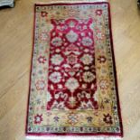 Indian small red wool rug 90cm x 165cm