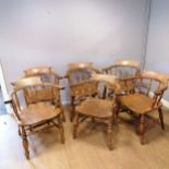 Matched set of six antique captains chairs, one has an old repair to a split in the seat otherwise