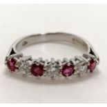 18ct hallmarked white gold ruby (4) & diamond (3) ring - size S & 4.7g total weight
