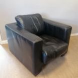 Modern brown leather armchair in good condition. 87cm wide x 88cm deep x 83cm high