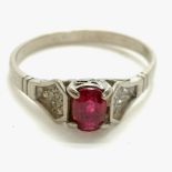14ct marked white gold ruby ring with diamond set shoulders - size P½ & 2.5g total weight ~ wear