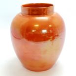 High fired orange glazed art pottery vase - 25cm high with firing fault to rim with slight loss to