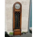 English long cased Art Deco style clock with arched top, A/F & glass to door separate. Has