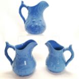 Set of three graduated blue antique jugs tallest 19cm high and in good used condition