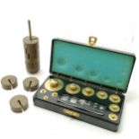 Bakelite cased set of metric weights by Philip Harris Ltd t/w a stack of brass 100g weights