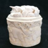 Antique Indian ivory lidded box with relief carved elephants 9cm wide x 11cm high in good condition.
