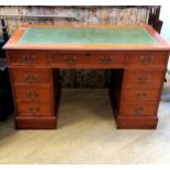 Twin mahogany twin pedestal desk in three parts with a green leather insert top and key for lockable