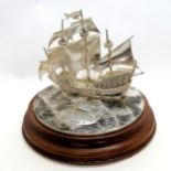 Silver model of the Golden Hind (#005) by Softley & Page (Michael Softley) mounted on a turned