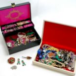 Qty of costume jewellery in a black & a white box inc hedgehog brooch, necklaces, Christmas earrings