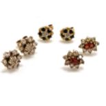 3 pairs of 9ct gold earrings inc garnet cluster & sapphire / diamond cluster - total weight 3.8g ~ 1