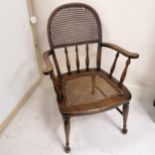 Antique oak armchair with rattan seat and back. Condition report1 small hole in the rattan otherwise