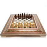 Chess set and Eastern/Islamic mosaic chess board 28cm x 28cm Condition reportSmall loss to 1 edge