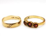 9ct marked gold garnet 3 stone ring (size P) t/w 9ct hallmarked gold band set with 3 chip