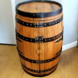 Bar/drinks cabinet converted from an oak whisky barrel with metal banding, 56cm diameter x 89cm high