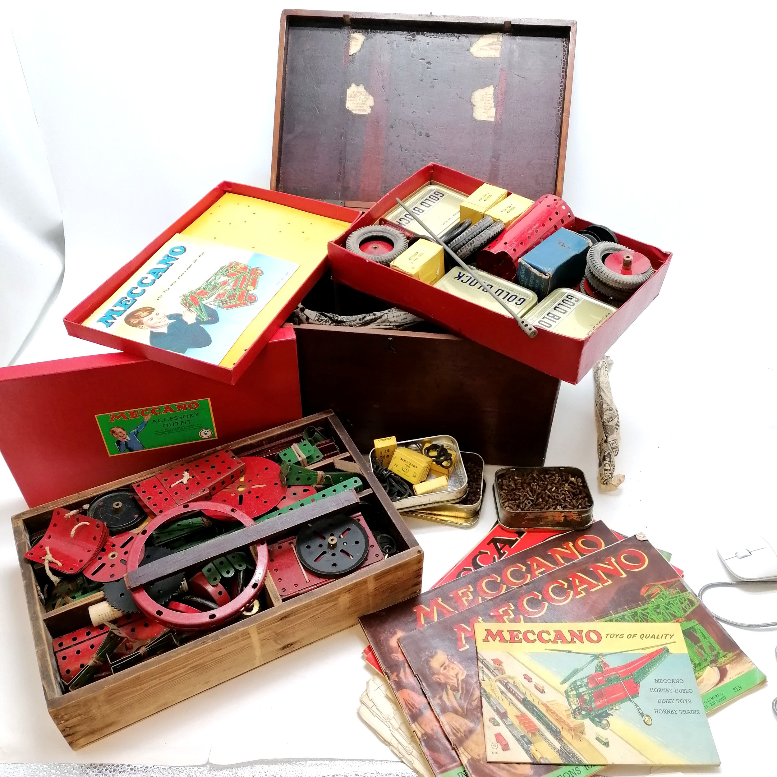 Qty of antique Meccano in a mahogany box inc catalogues, boxed parts etc - 39cm x 25cm x 23cm