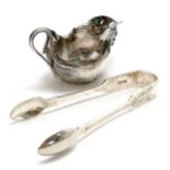 1898 silver cream jug with arum lily detail to handle by James Dixon & Sons Ltd t/w 1916 silver