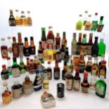 Large qty of miniature drinks inc Gordons gin, apricot brandy, Grand marnier etc