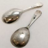 2 x silver caddy spoons - 1 with thistle detail to end of handle (10cm) - weight (2) 26g