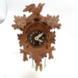 Small carved wood cuckoo clock (16cm x 10cm) - has key & pendulum - WE CANNOT GUARANTEE THE