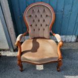 mahogany open arm chair with beige upholstery