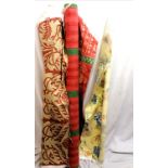 terracotta and green roll of fabric, beige and terracotta roll of fabric T/W a yellow floral roll of