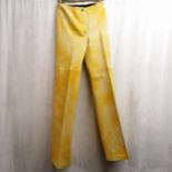 1960's yellow leather trousers, slightly flared. size small