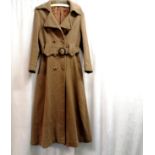 1970's brown tweed belted ladies coat, the lining has holes and damage to the hem