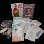 Quantity of vintage sewing patterns, two books and a quantity of buttons