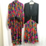 2 1970's Parigi long dresses, black crepe and silk size 10 and multi coloured silk size 14