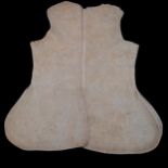 Late 17th C hand stitched quilted waistcoat with lace fastening holes to the front and shoulders.