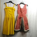 2 1950's dresses, 1 yellow cotton 1 red black and white cotton gingham, both size small