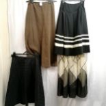 2 1960's skirts, 1 black quilted the other black and white silk, T/W a black and white Jaeger wool