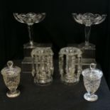 Pair of glass lustres 22cm high, pair of antique chippendale glass comports 25cms high, pair of